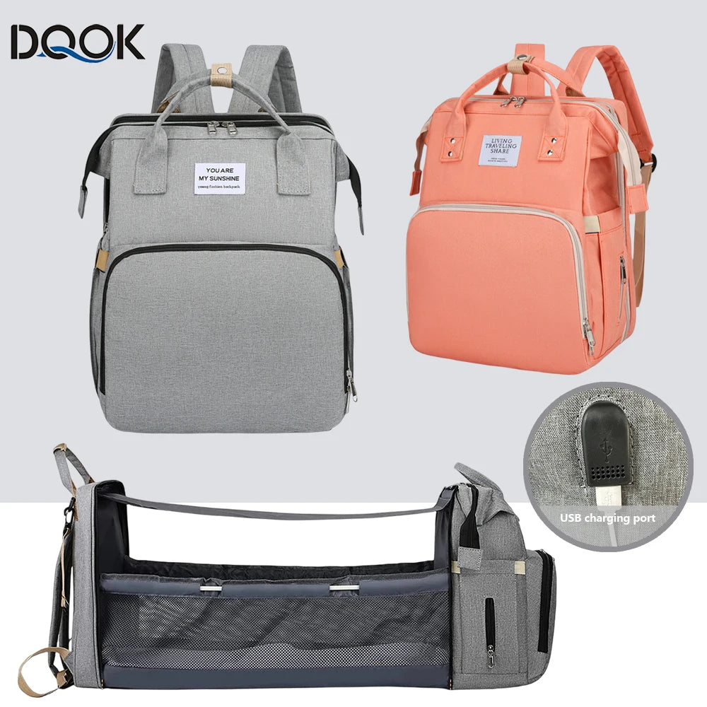 Sac polyvalent convertible en berceau de voyage "Le Sac à Magie de Maman"