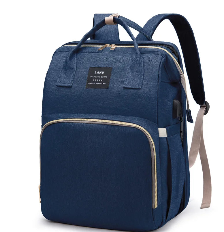 Sac polyvalent convertible en berceau de voyage "Le Sac à Magie de Maman"